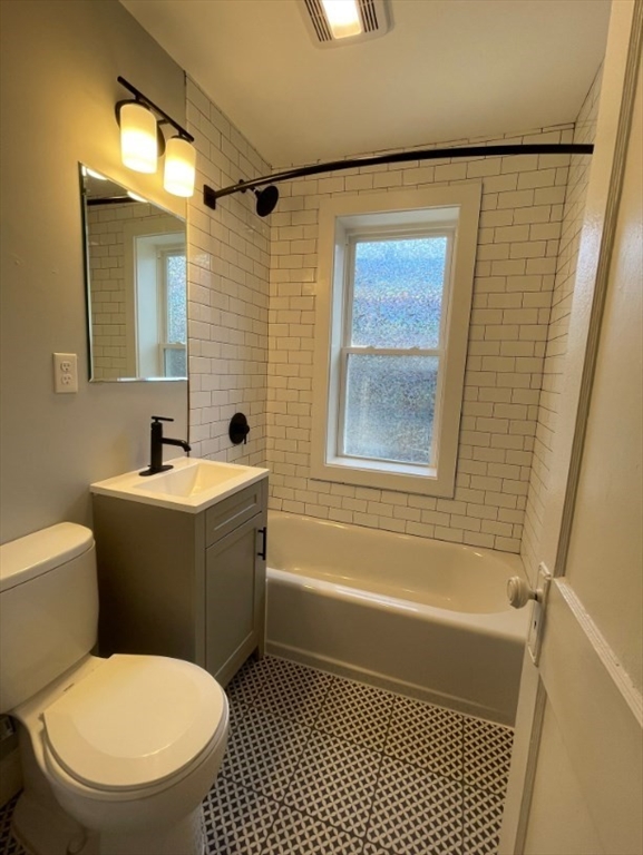 233 Lafayette Street, Unit 4 Salem, MA 01970 - Photo 7 of 8 a bathroom with a toilet a sink and a bathtub