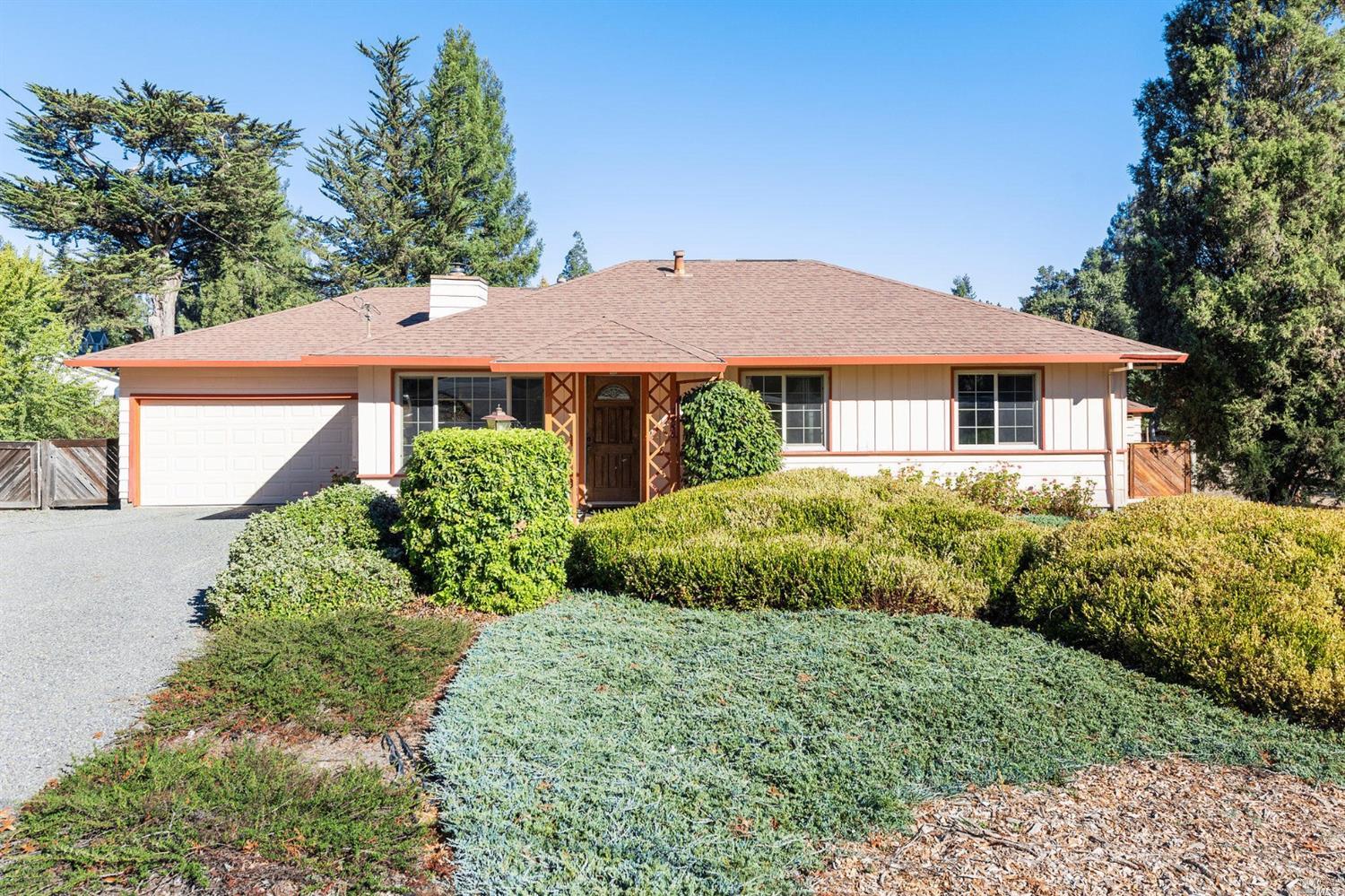 7950 Lynch Road Sebastopol, CA 95472 - Photo 1 of 1 a view of a white house with a yard and plants