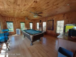 394 Highway 447 Newfoundland, PA 18445 - Photo 11 of 50 a large living room with a large window
