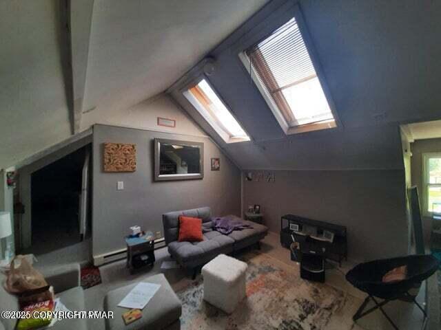 394 Highway 447 Newfoundland, PA 18445 - Photo 22 of 50 a living room with furniture and a flat screen tv