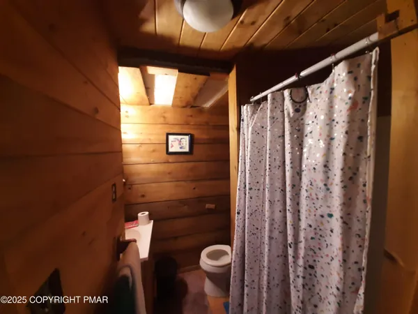 a kitchen with a refrigerator and a stove