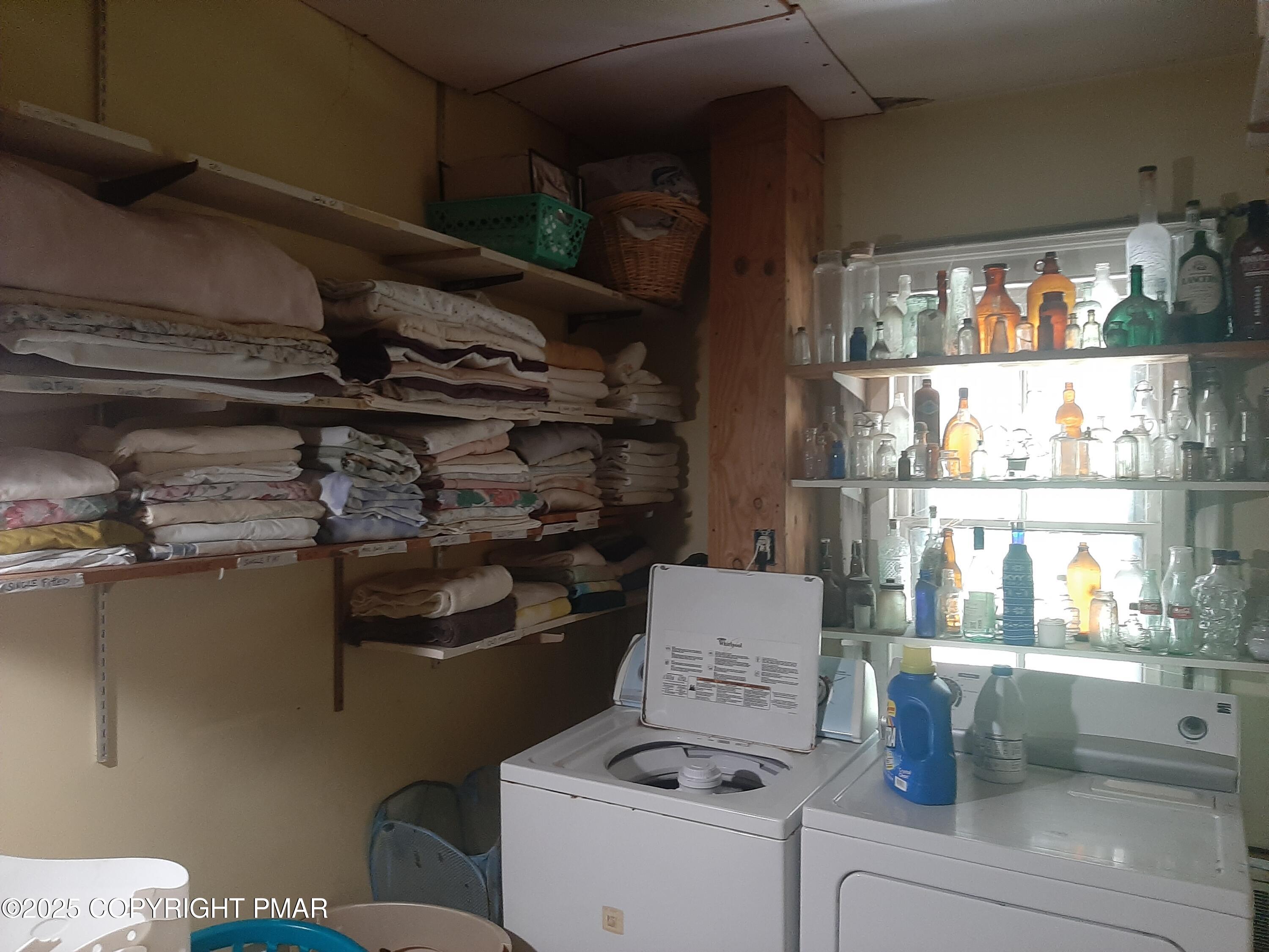 394 Highway 447 Newfoundland, PA 18445 - Photo 26 of 50 a kitchen with a refrigerator and a stove