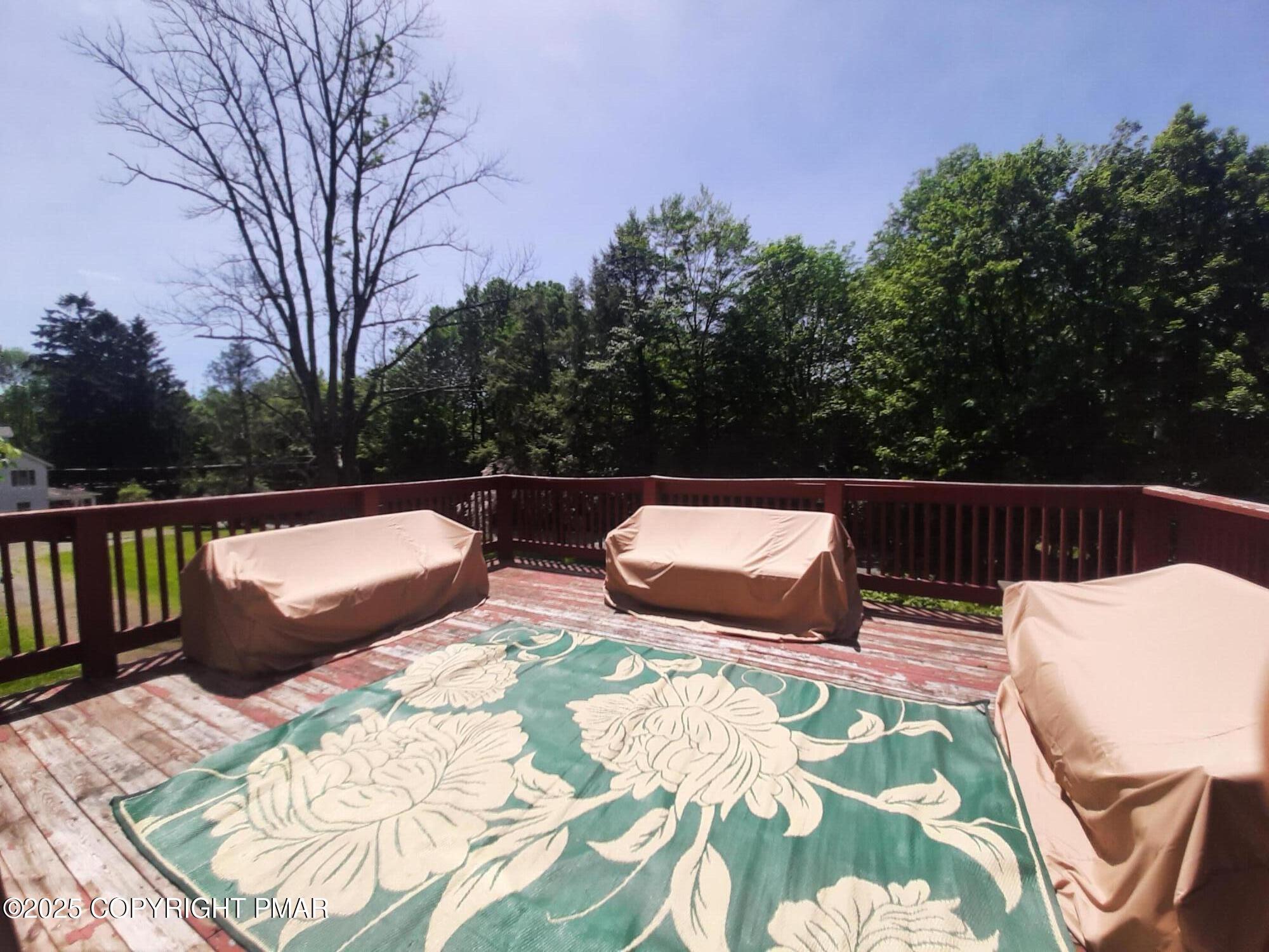 394 Highway 447 Newfoundland, PA 18445 - Photo 32 of 50 a view of swimming pool with a couches