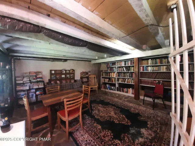 a view of a livingroom with a staircase