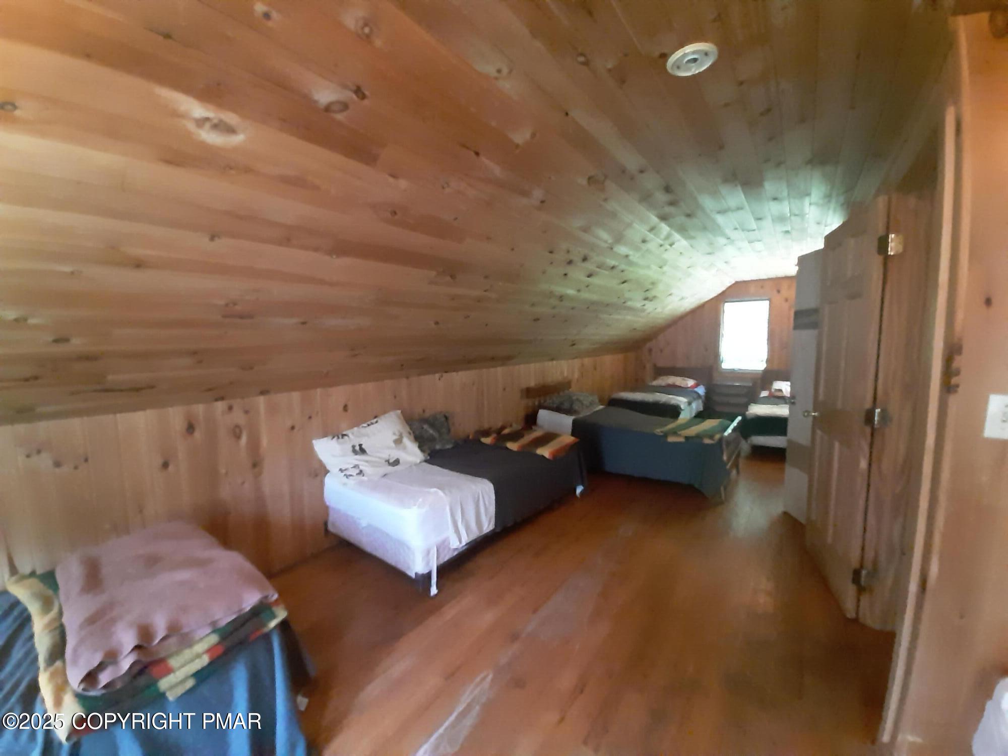 394 Highway 447 Newfoundland, PA 18445 - Photo 40 of 50 a view of a livingroom with furniture and a floor to ceiling window