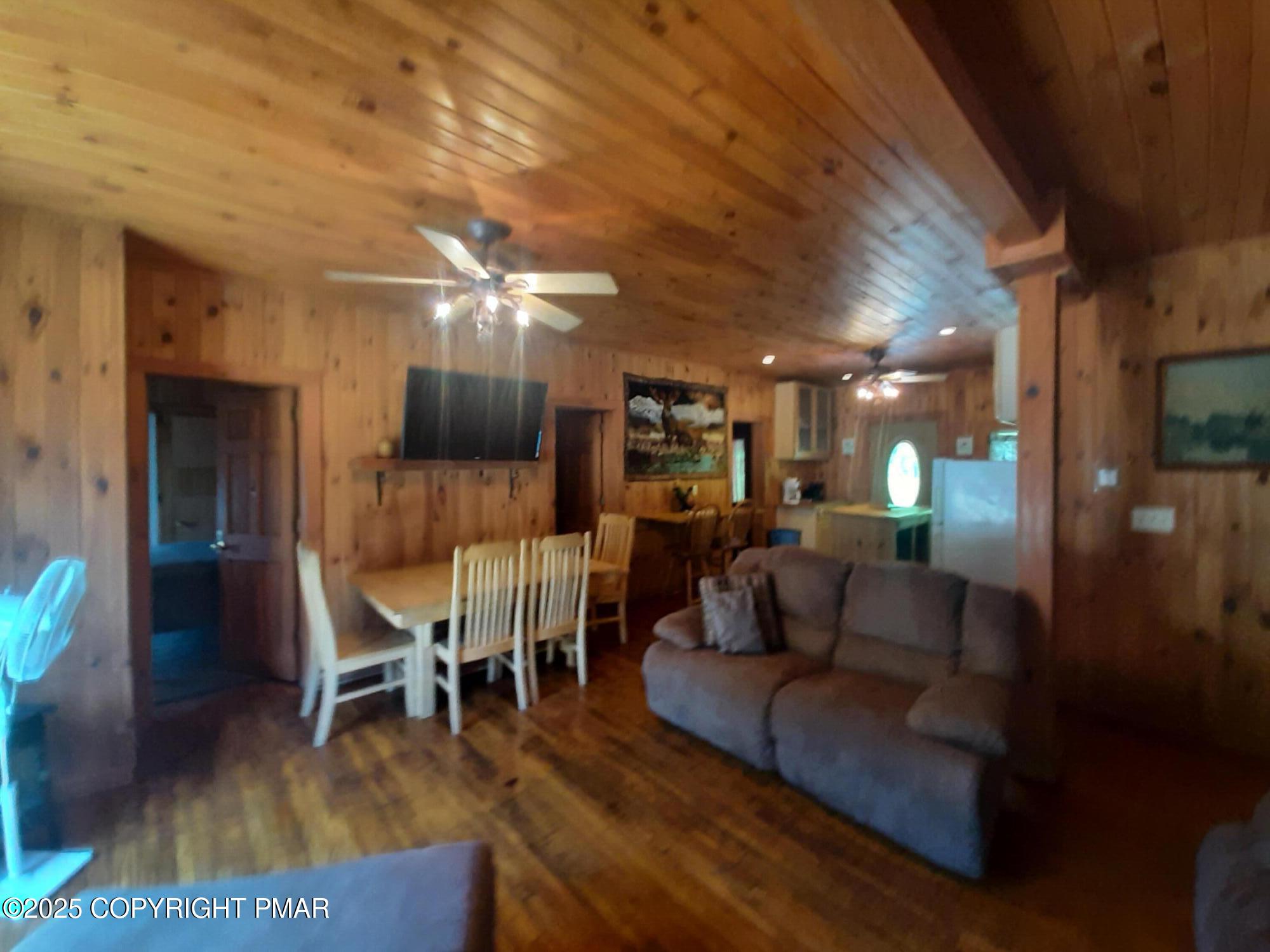 394 Highway 447 Newfoundland, PA 18445 - Photo 42 of 50 a living room with furniture and wooden floor