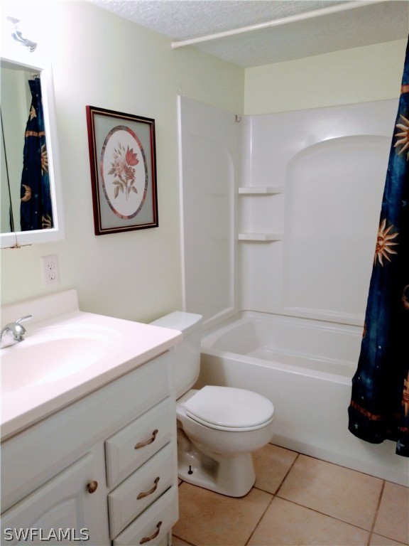 7351 Pinehurst Road Bokeelia, FL 33922 - Photo 23 of 31 a bathroom with a toilet a sink and a bathtub