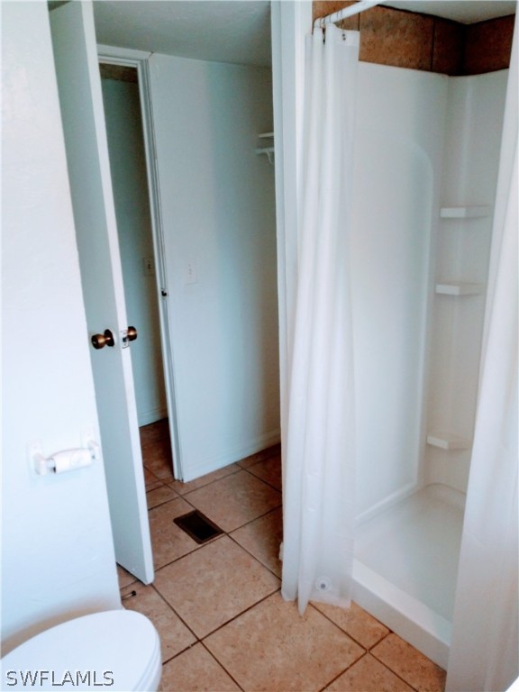 7351 Pinehurst Road Bokeelia, FL 33922 - Photo 27 of 31 a bathroom with a sink and toilet
