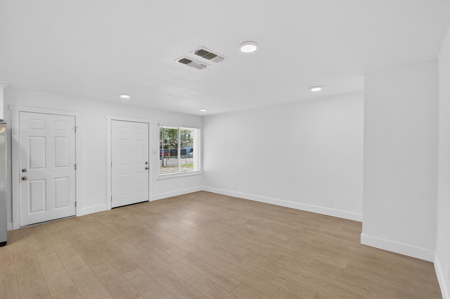 10457 Rockingham Drive Rancho Cordova, CA 95670 - Photo 14 of 49 a view of an empty room with a window