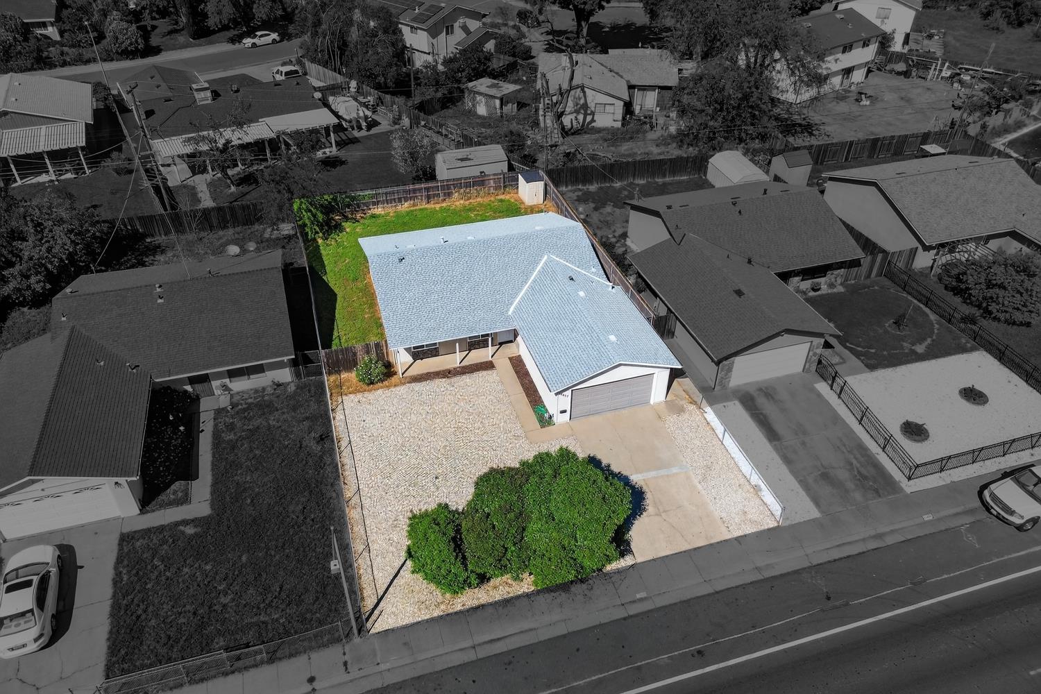 10457 Rockingham Drive Rancho Cordova, CA 95670 - Photo 2 of 49 an aerial view of a house with garden space and street view