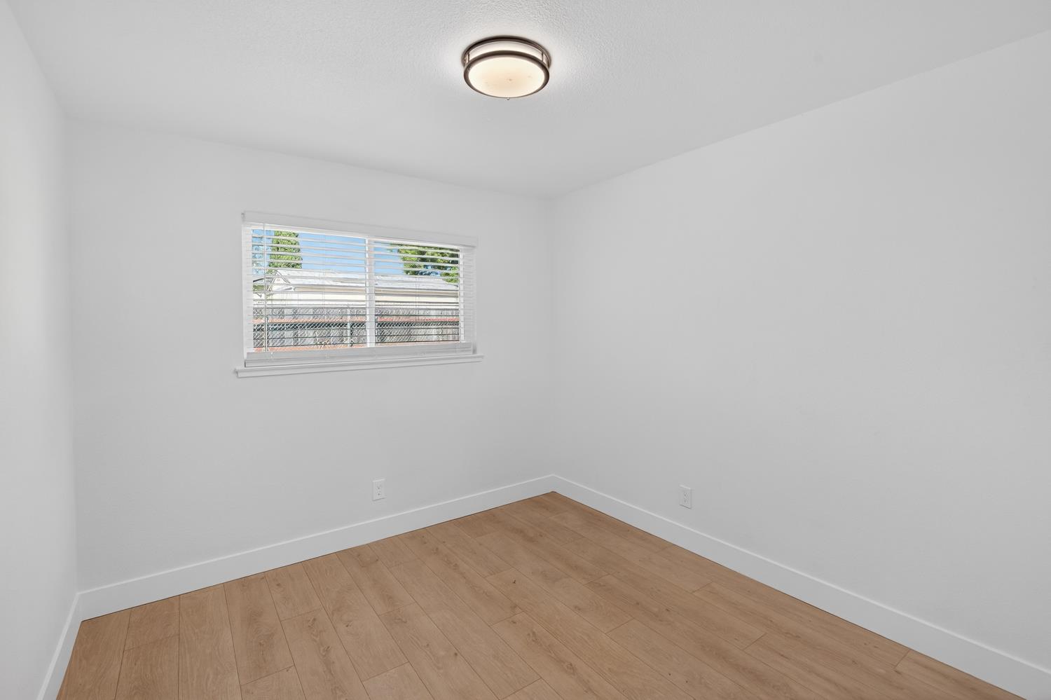 10457 Rockingham Drive Rancho Cordova, CA 95670 - Photo 24 of 49 an empty room with a window