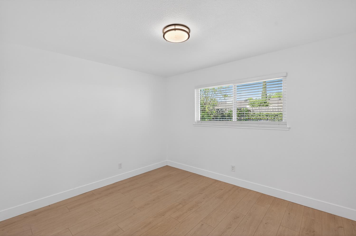 10457 Rockingham Drive Rancho Cordova, CA 95670 - Photo 26 of 49 an empty room with a window