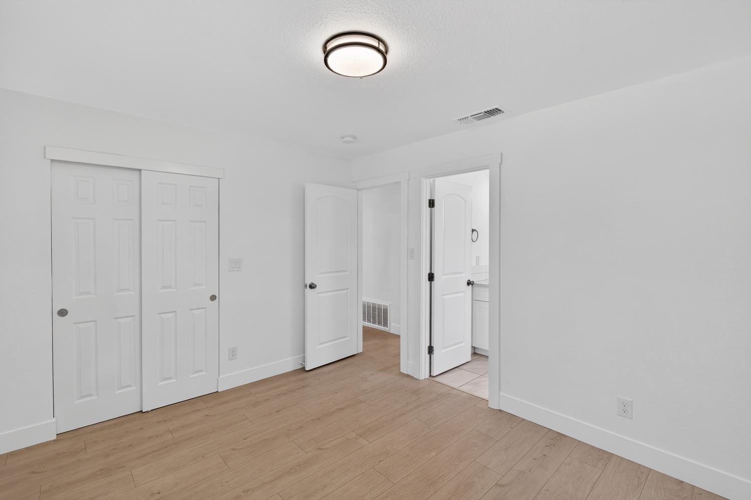 10457 Rockingham Drive Rancho Cordova, CA 95670 - Photo 27 of 49 a view of an empty room and a window