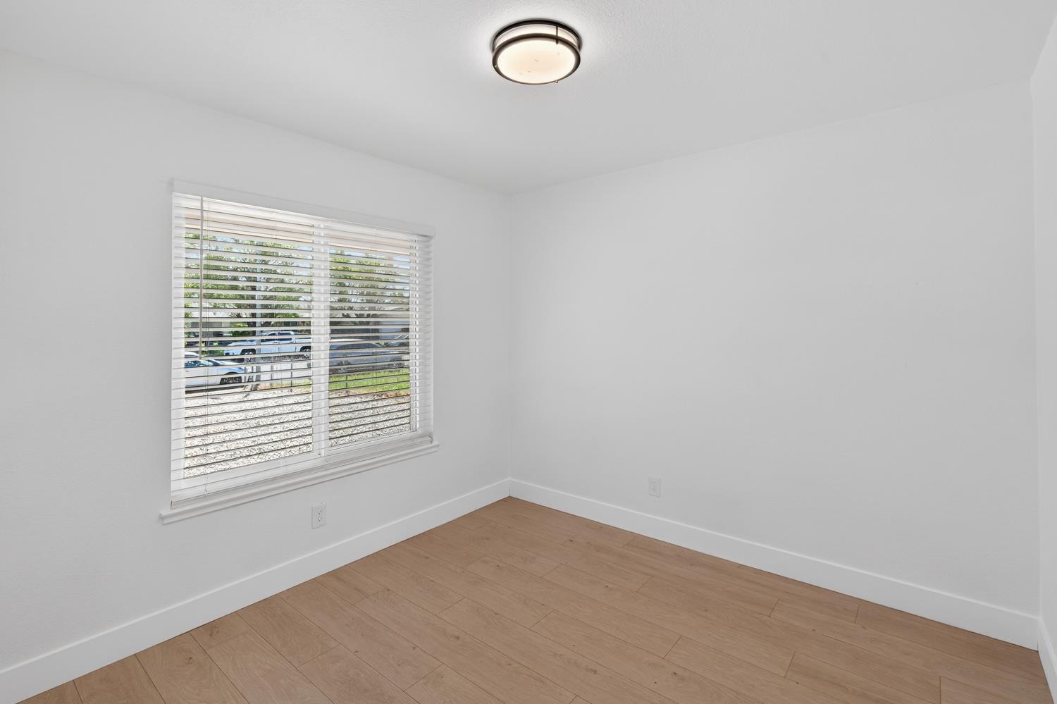 10457 Rockingham Drive Rancho Cordova, CA 95670 - Photo 33 of 49 an empty room with a window