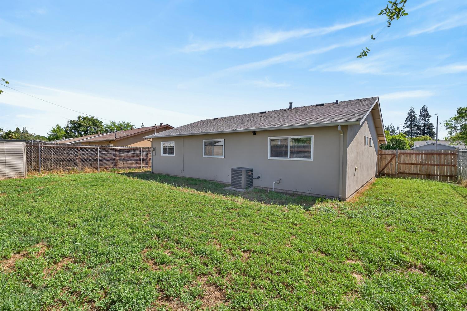 10457 Rockingham Drive Rancho Cordova, CA 95670 - Photo 39 of 49 a view of a backyard with plants and a garden