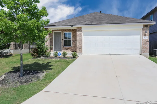 a front view of house with yard