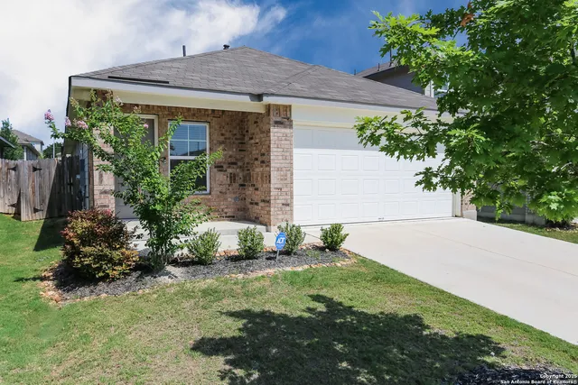 a front view of house with garden