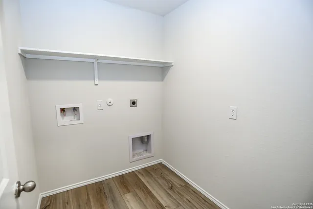 a view of small space with racks on the wall