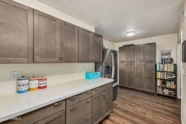 a kitchen with stainless steel appliances a refrigerator and a sink