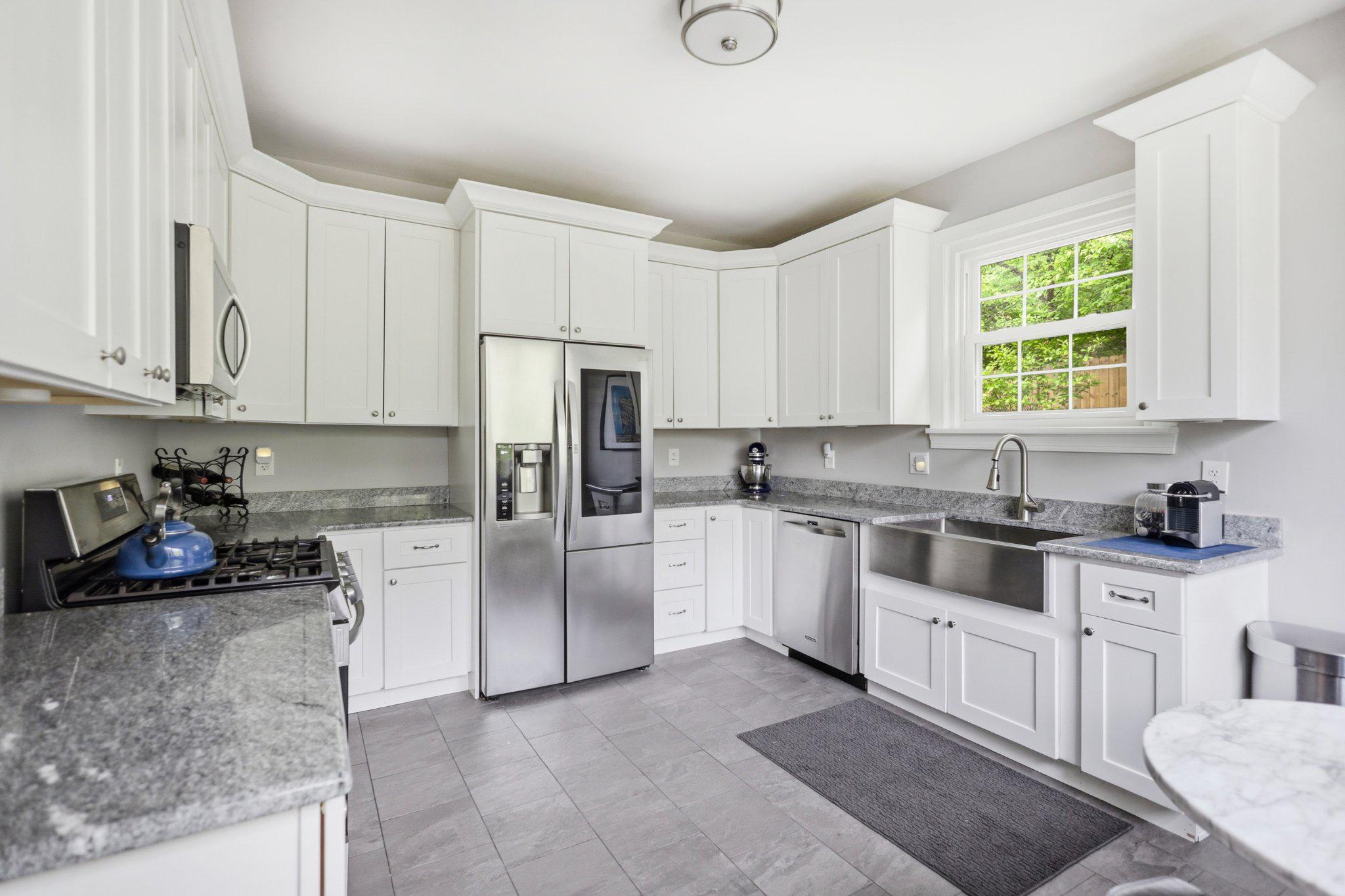 91 East Bells Mill Road Philadelphia, PA 19118 - Photo 12 of 29 Modern kitchen w/ stainless steel appliance suite