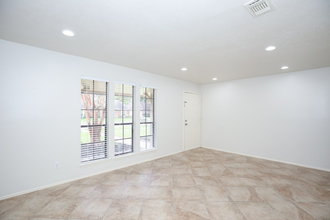 3003 Planters Street Sugar Land, TX 77479 - Photo 27 of 40 a view of an empty room with a window