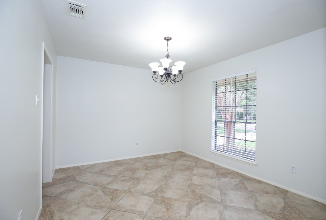 3003 Planters Street Sugar Land, TX 77479 - Photo 29 of 40 a view of a chandelier in a room