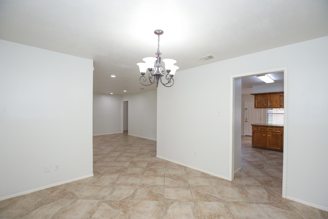 3003 Planters Street Sugar Land, TX 77479 - Photo 31 of 40 a view of a chandelier in big room and a bathroom