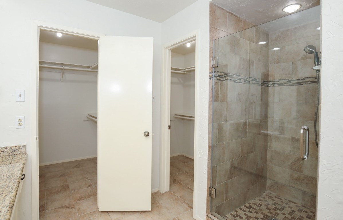 3003 Planters Street Sugar Land, TX 77479 - Photo 4 of 40 a bathroom with a shower and a sink