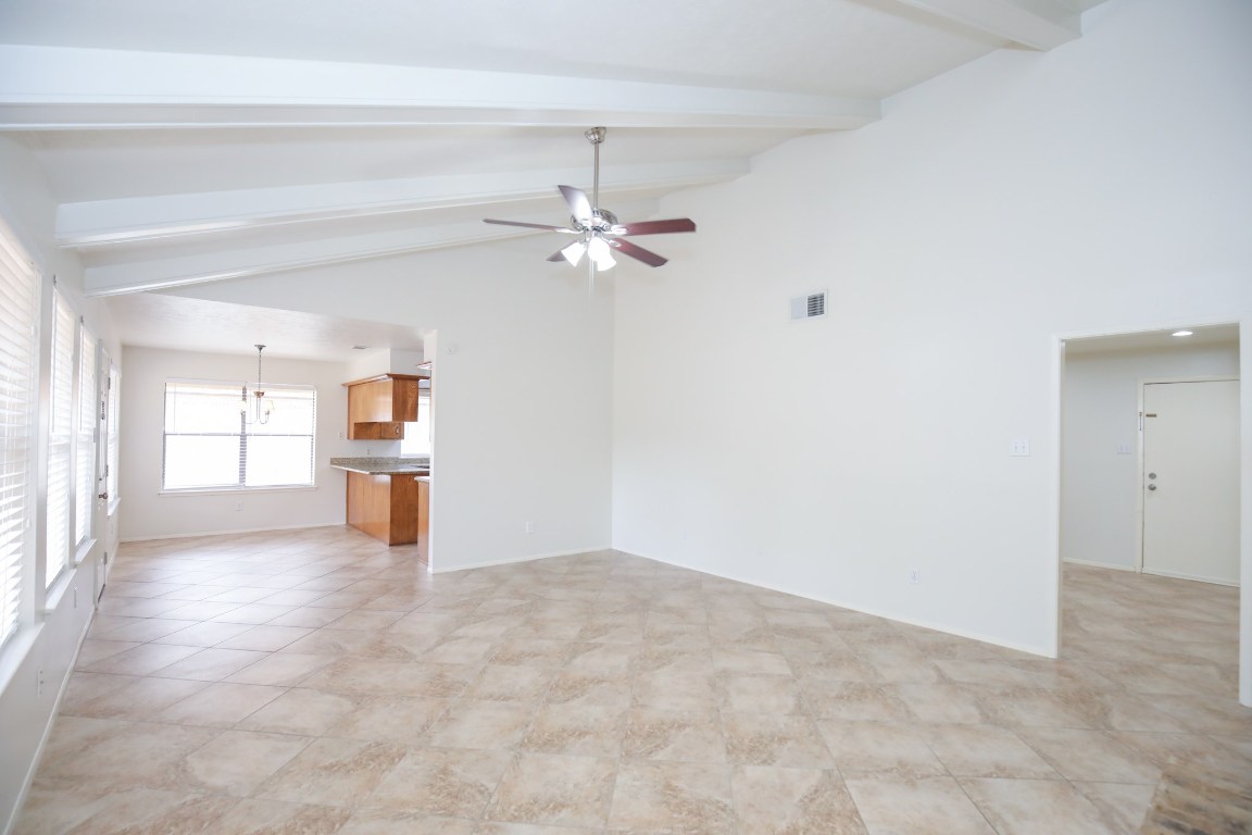 3003 Planters Street Sugar Land, TX 77479 - Photo 7 of 40 wooden floor in an empty room with a window