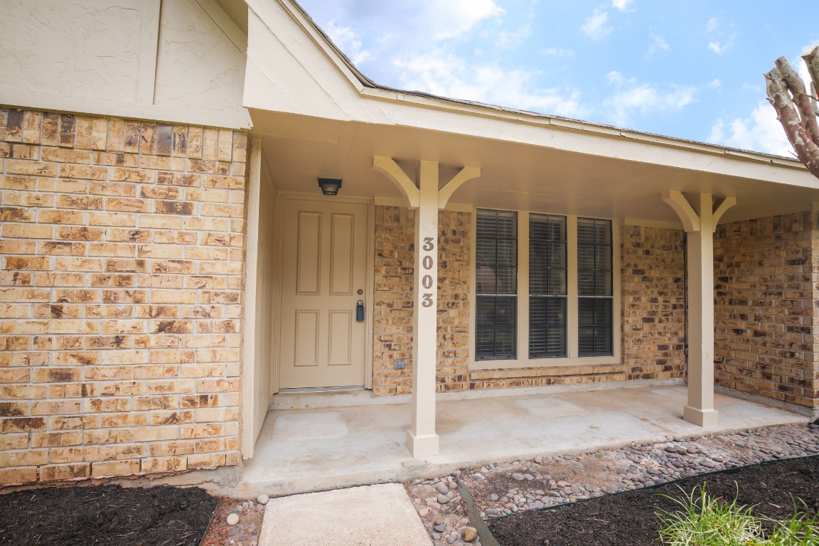 3003 Planters Street Sugar Land, TX 77479 - Photo 8 of 40 a view of front door