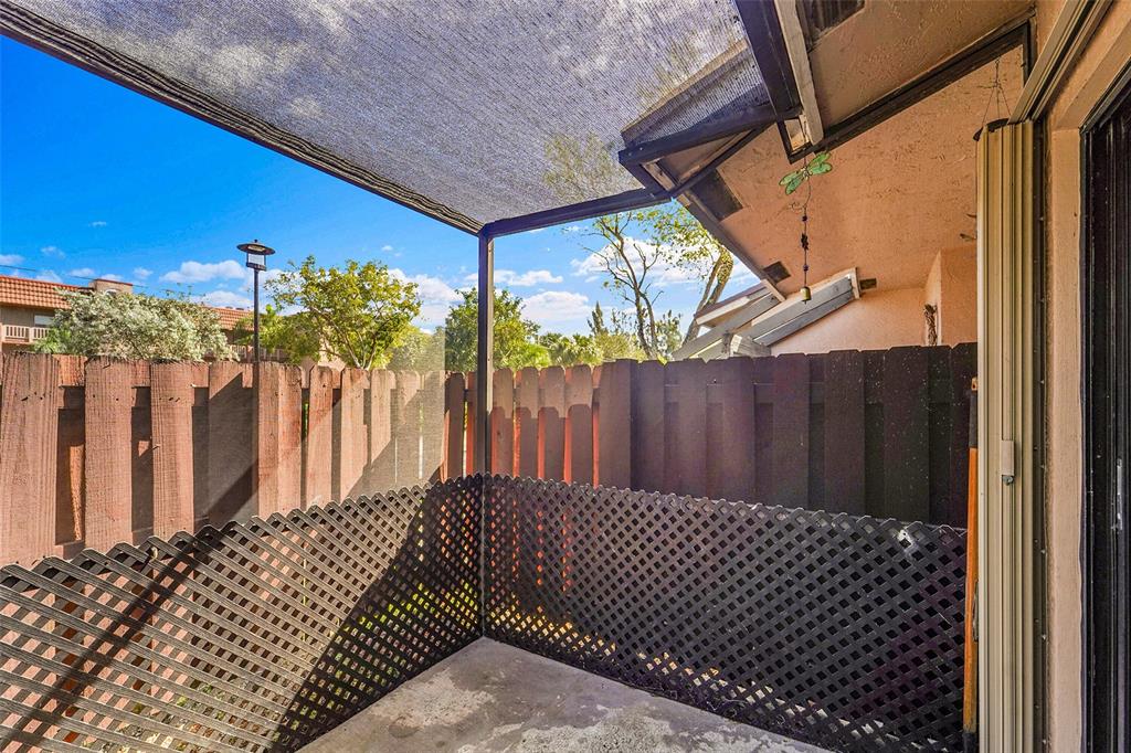 2698 North Nob Hill Road Sunrise, FL 33322 - Photo 23 of 27 a view of a black gate