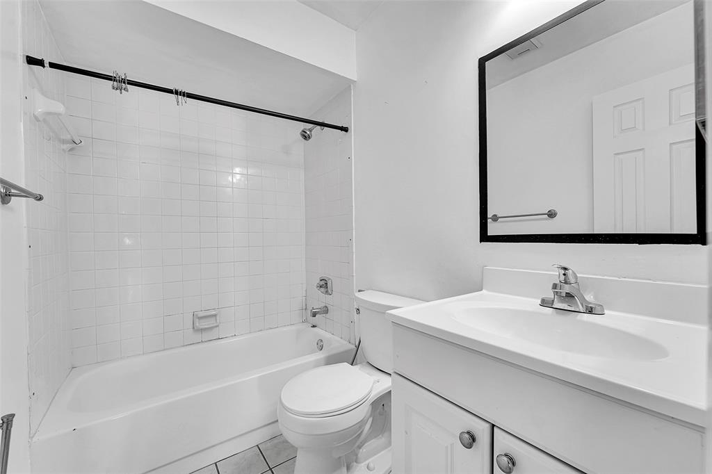 2698 North Nob Hill Road Sunrise, FL 33322 - Photo 9 of 27 a bathroom with a sink toilet and shower