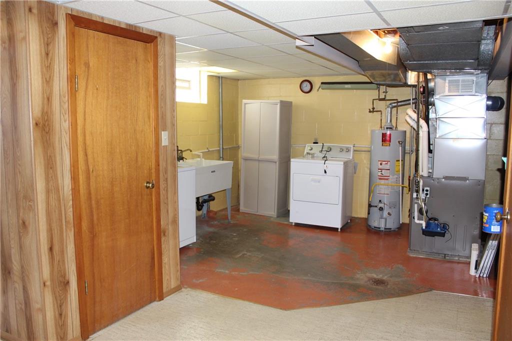 4115 Mt Troy Road Pittsburgh, PA 15214 - Photo 19 of 22 ~View of the laundry area as well as the hot water tank and furnace~