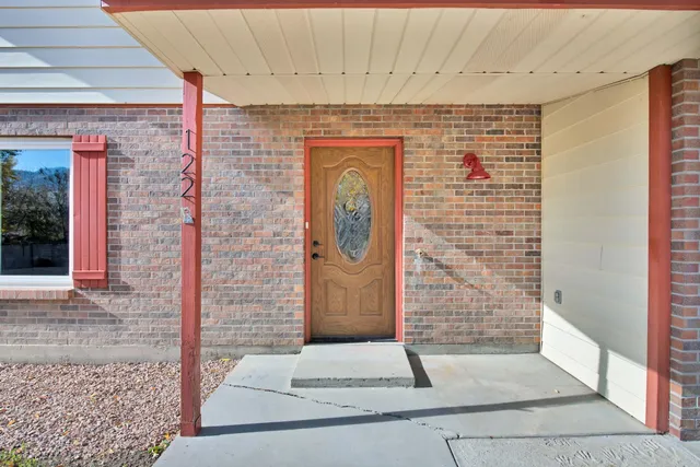 a front view of a house with a shower