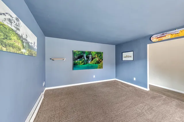 a kitchen with a refrigerator stove and microwave