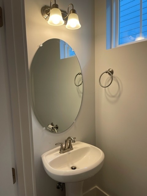 525 Black Tea Way Franklin, TN 37064 - Photo 18 of 51 a bathroom with a sink and a mirror