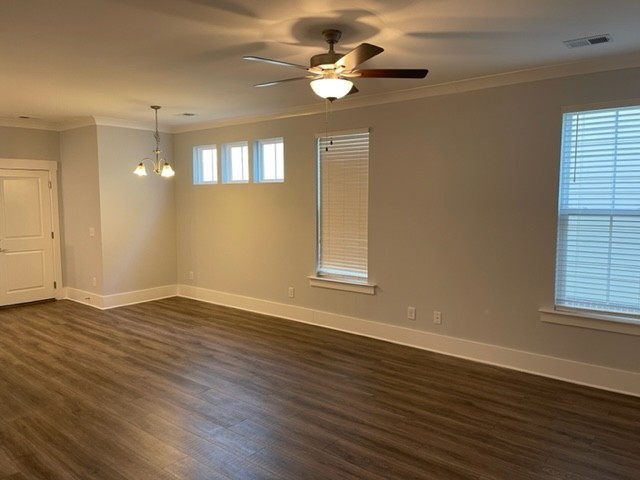 525 Black Tea Way Franklin, TN 37064 - Photo 20 of 51 a view of an empty room with wooden floor and a window
