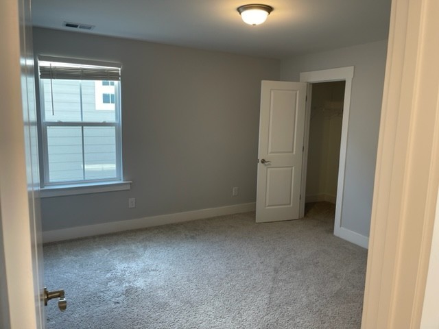 525 Black Tea Way Franklin, TN 37064 - Photo 38 of 51 an empty room with windows