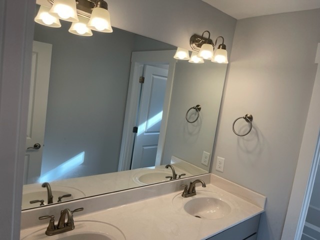 525 Black Tea Way Franklin, TN 37064 - Photo 39 of 51 a bathroom with a sink vanity and a mirror