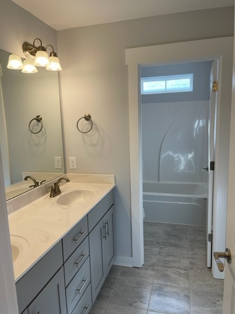 525 Black Tea Way Franklin, TN 37064 - Photo 40 of 51 a bathroom with a sink and a mirror