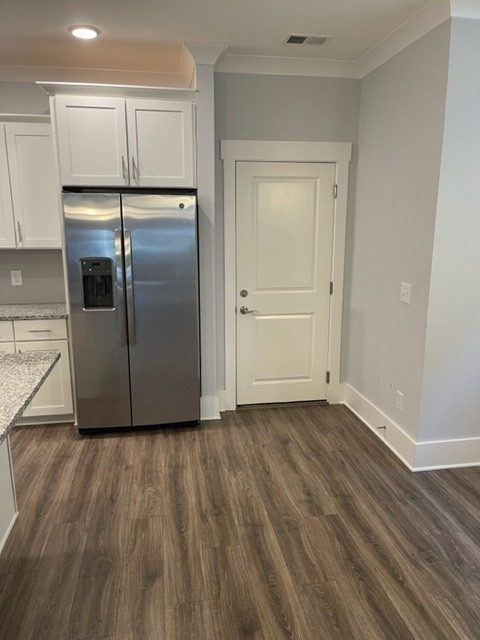 525 Black Tea Way Franklin, TN 37064 - Photo 44 of 51 a view of a refrigerator in kitchen and wooden floor