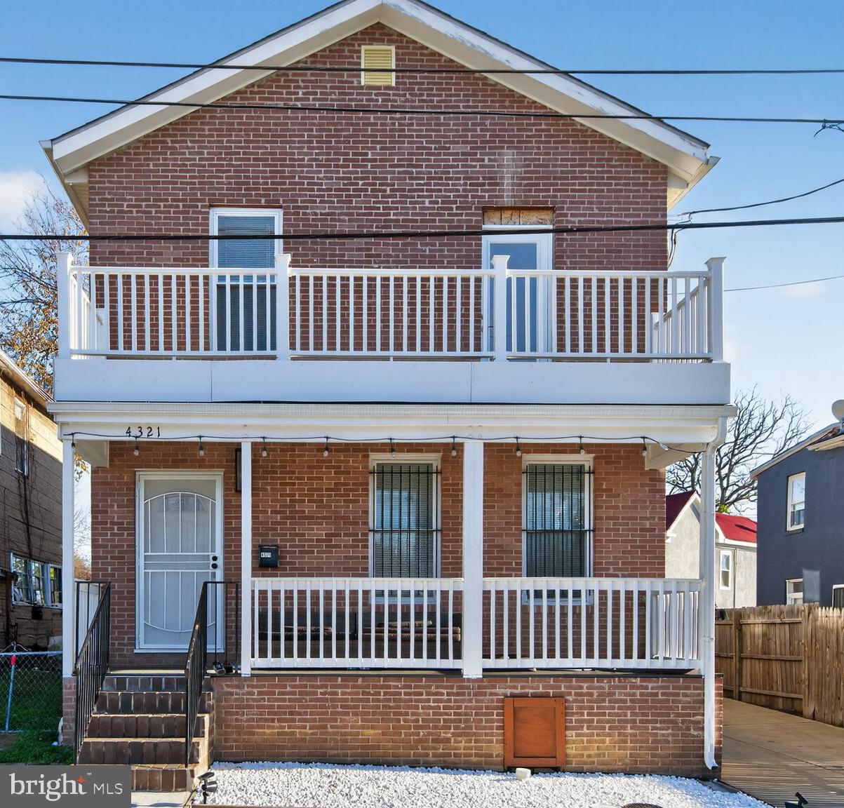4321 Minnesota Avenue Northeast Washington, DC 20019 - Photo 1 of 24 a view of a house with a deck