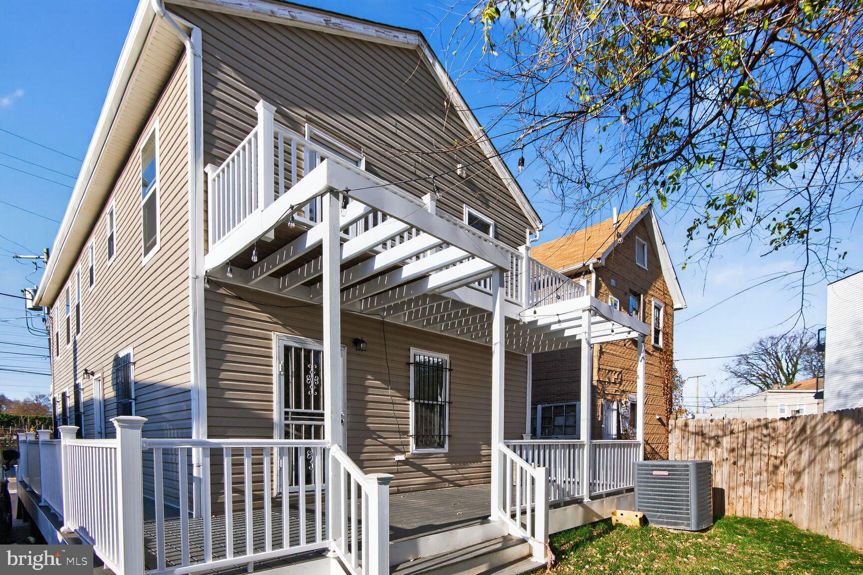 4321 Minnesota Avenue Northeast Washington, DC 20019 - Photo 22 of 24 a view of a house with a tree