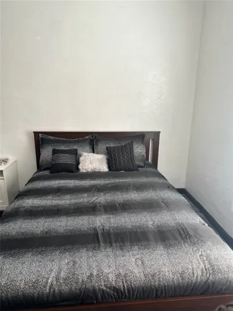 a living room with a couch and a flat screen tv