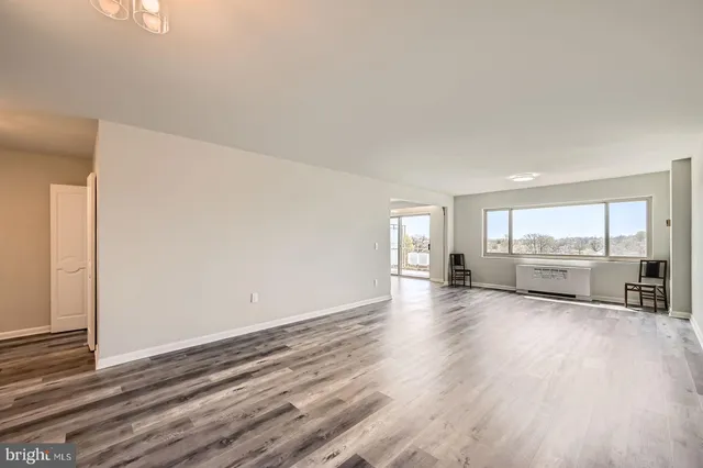 a living room with couches and a coffee table
