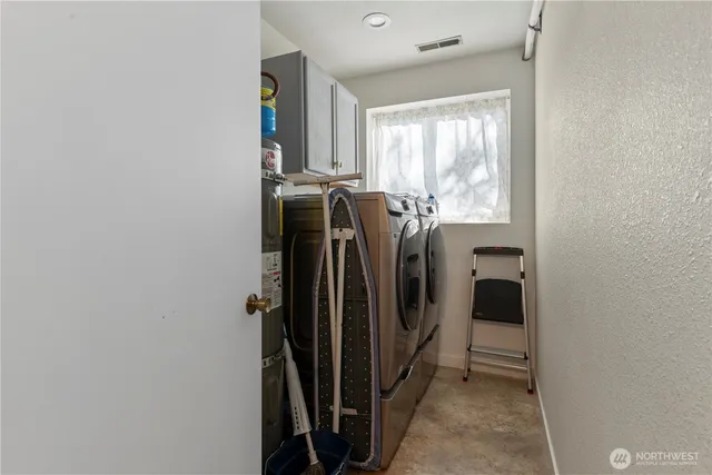 a bathroom with a toilet sink and a mirror