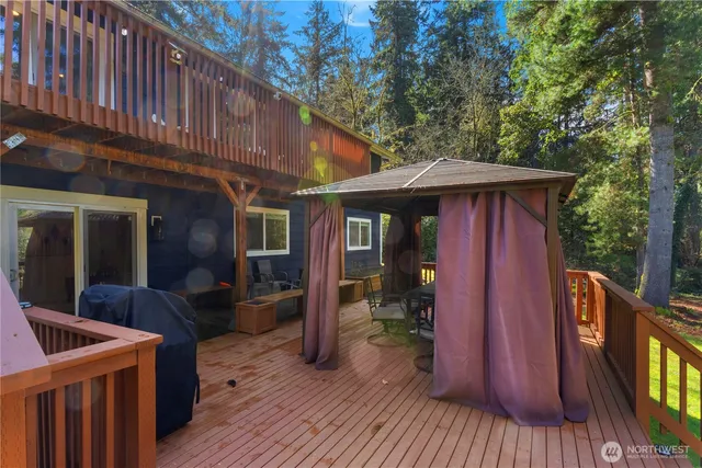 a view of a chairs and table in the patio of the house