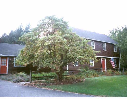 22 Lantern Drive Ridgefield, CT 06877 - Photo 1 of 1 a view of house with a yard and potted plants