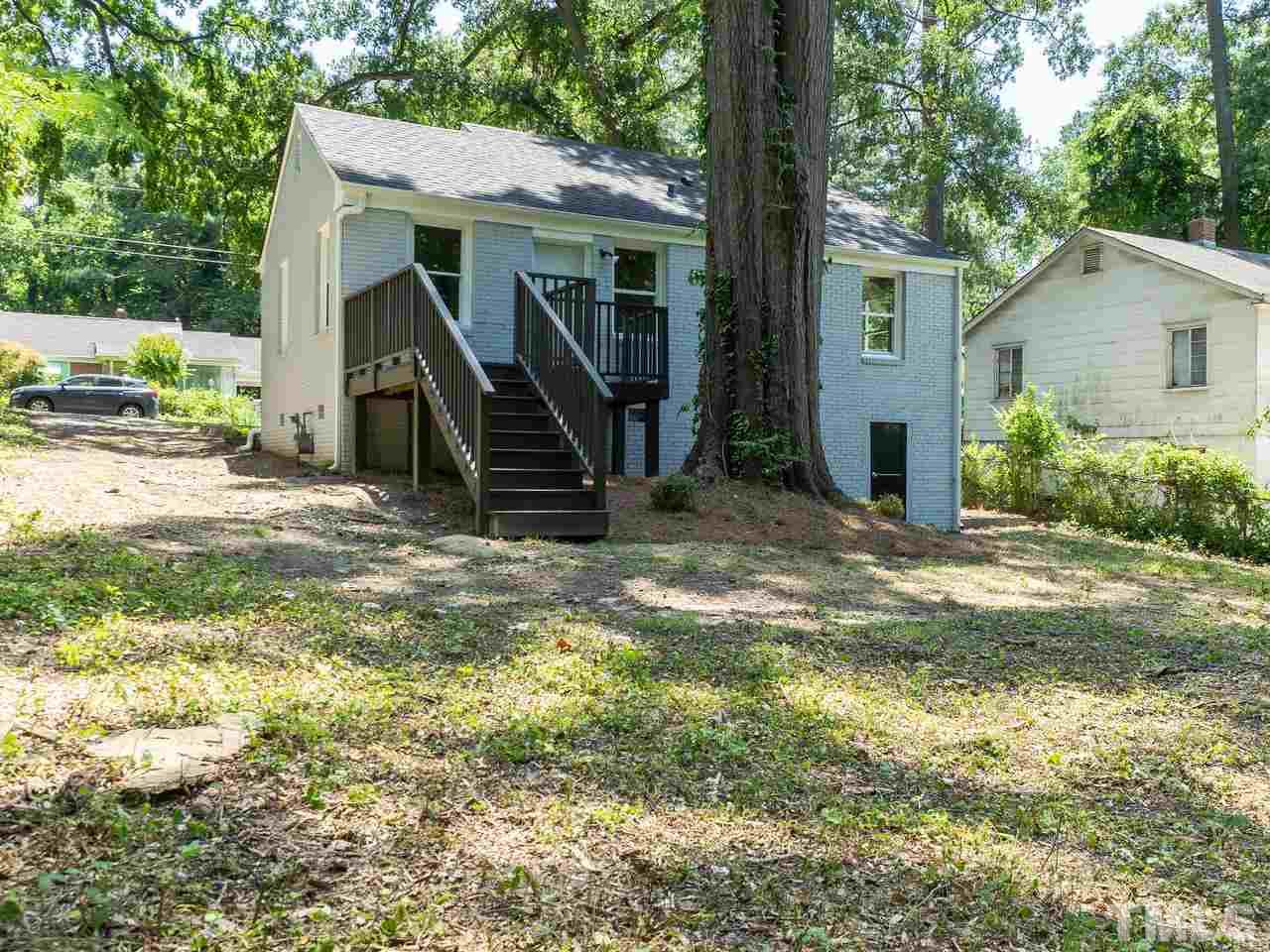 332 Angier Avenue Raleigh, NC 27610 - Photo 6 of 30 a view of a house with backyard and sitting area