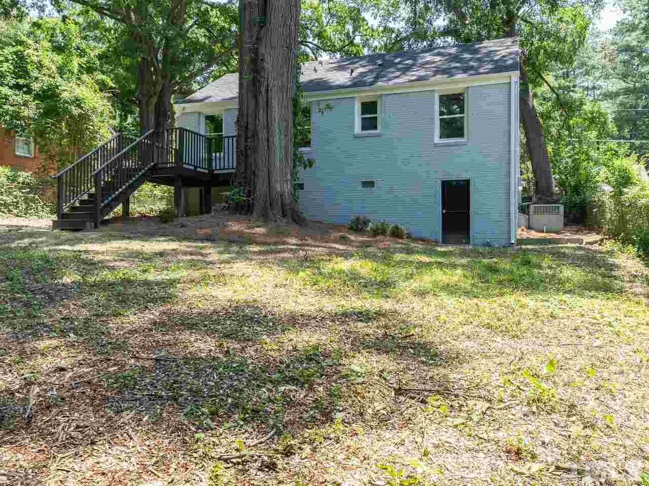332 Angier Avenue Raleigh, NC 27610 - Photo 7 of 30 a view of a house with backyard and sitting area